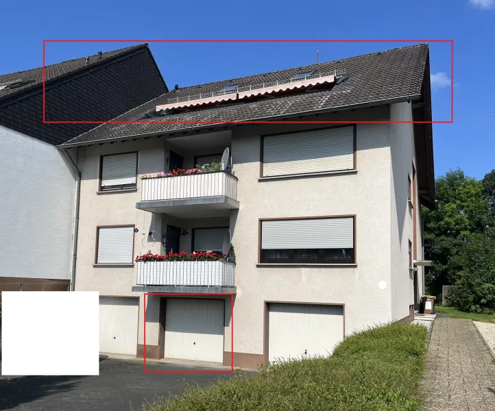 Straßenansicht - Wohnung kaufen in Altenkirchen - Gepflegte Eigentumswohnung mit sep. Garage in attraktiver Lage!