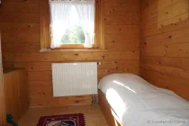 Schlafzimmer in Holzanbau