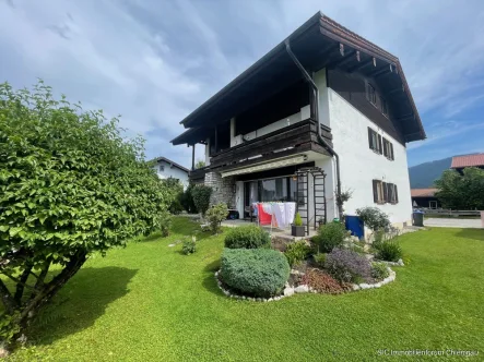 Gartensicht - Wohnung kaufen in Inzell - Vermietete 2 Zimmer-Erdgeschosswohnung mit Terrasse in ruhiger und sonniger Lage von Inzell.