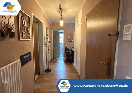  - Wohnung kaufen in Freudenberg - Gemütliche 2-Zimmer-Wohnung mit Südbalkon und Garage!