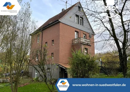 Titelbild - Haus kaufen in Marienheide - VR IMMO: Zweifamilienhaus mit großem Garten und Garage