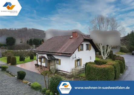 Ansicht - Haus kaufen in Burbach - VR IMMO: Gemütliches Einfamilienhaus mit großer Terrasse und Doppelgarage in Burbach-Wahlbach!