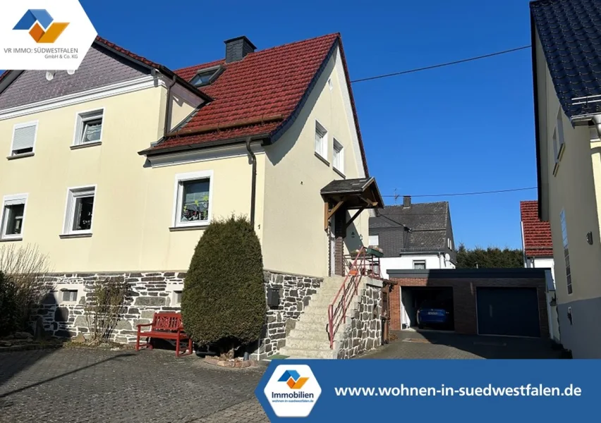 Ein Angebot der... - Haus kaufen in Netphen - VR IMMO: Netphen- topgepflegtes Einfamilienhaus mit Garage und schönem Garten!