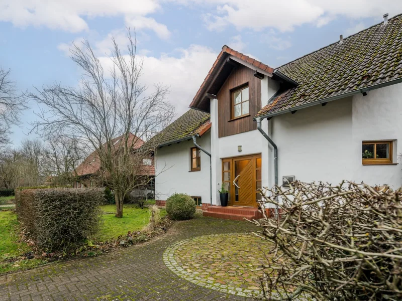 Hausansicht - Haus kaufen in Gilten - EINFAMILIENHAUS IN GILTEN