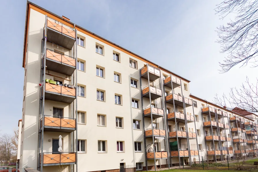 Rückansicht - Wohnung kaufen in Leipzig - Solide Familienwohnung mit Südwest-Balkon