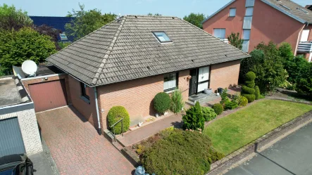 Luft - Haus kaufen in Ibbenbüren - Gepflegter Bungalow mit schönem Garten in ruhiger Wohnlage