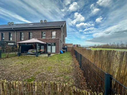 Seitenansicht 1.1 - Haus mieten in Münster - Traumhaftes neuwertiges REH mit Garten und Carport