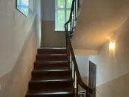 Haupthaus Treppe zu Pensionszimmer