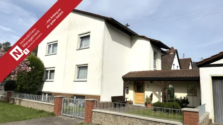 Titelbild - Haus kaufen in Mehlingen - Gepflegtes Zweifamilienhaus mit Doppelgarage in sehr guter Lage
