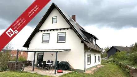 Titelbild - Haus kaufen in Kaiserslautern / Siegelbach - Zweifamilienhaus in sehr guter Lage mit großem Grundstück