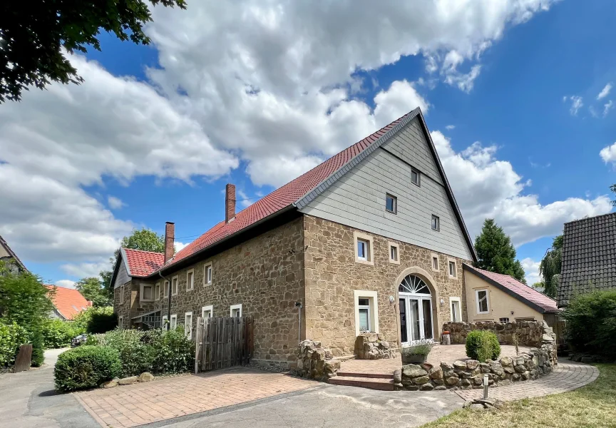 Immobilien mit Herz - Haus kaufen in Bad Salzuflen - Wunderschönes Bruchsteinhaus vermietet / großer Dachboden ausbaufähig