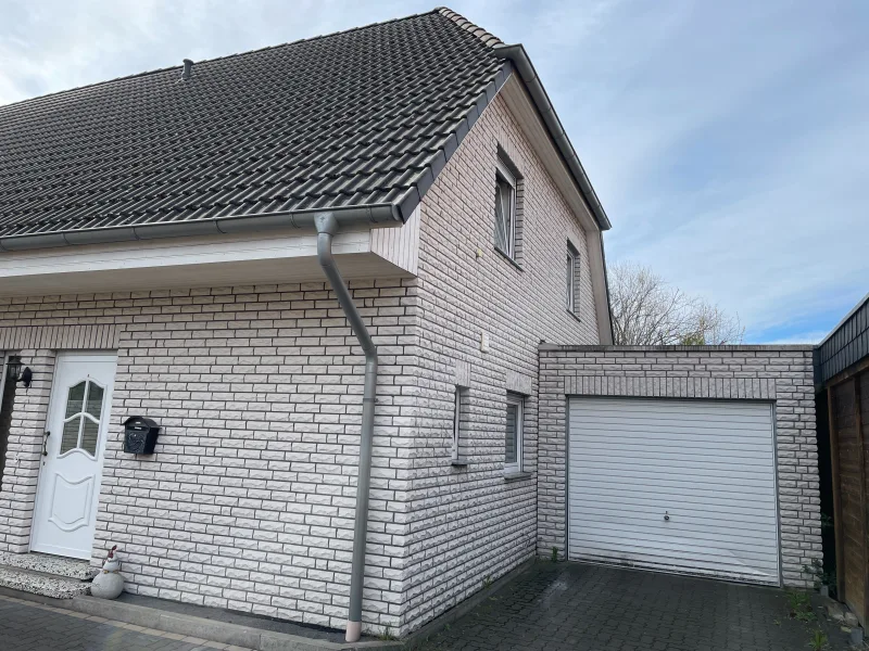 Immobilien mit Herz - Haus kaufen in Lehrte - Doppelhaushälfte vermietet