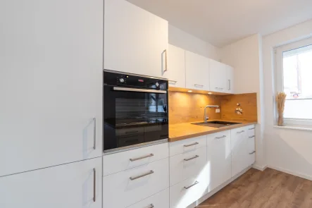 Wohnküche Blick 1 - Wohnung kaufen in Kiel - Bezugsfreie 3-Zimmer-Neubau-Eigentumswohnung im Erdgeschoss