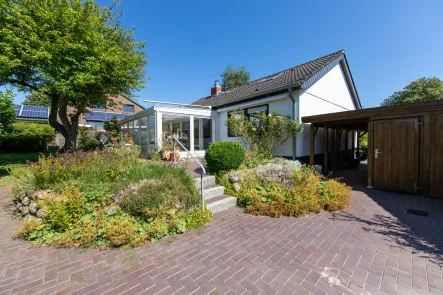 Blick auf den Wintergarten - Haus kaufen in Gettorf - Der Traum vom Eigenheim - Einfamilienhaus mit gepflegten Garten in ruhiger Lage: 24214 Gettorf