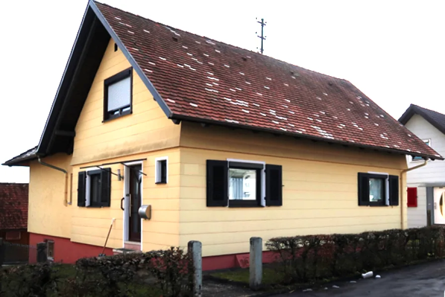 Ansicht - Haus kaufen in Oberndorf - Einfamilienhaus mit zwei Balkonen, schönem Garten und Doppelgarage