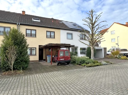  - Haus kaufen in Rodgau - Gemütliches Reihenmittelhaus mit Garten in idealer Lage für Familien