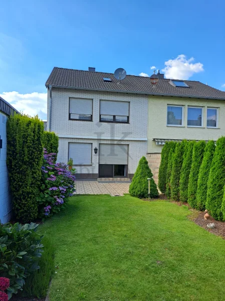 Blick auf das Haus - Haus kaufen in Bergheim Fliesteden - Familienfreundliches Wohngebiet in Fliesteden.