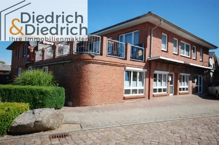 Mehrfamilienhaus in Tellingstedt Kreis Dithmarschen - Haus kaufen in Tellingstedt - Verkauf eines gepflegten vermieteten Mehrfamilienhauses mit 6 Wohneinheiten im Zentrum von Tellingstedt