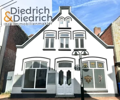 Vorderansicht - Haus kaufen in Heide - Verkauf eines stilvollen Wohn-und Geschäftshauses in einer TOP Lage in Heide