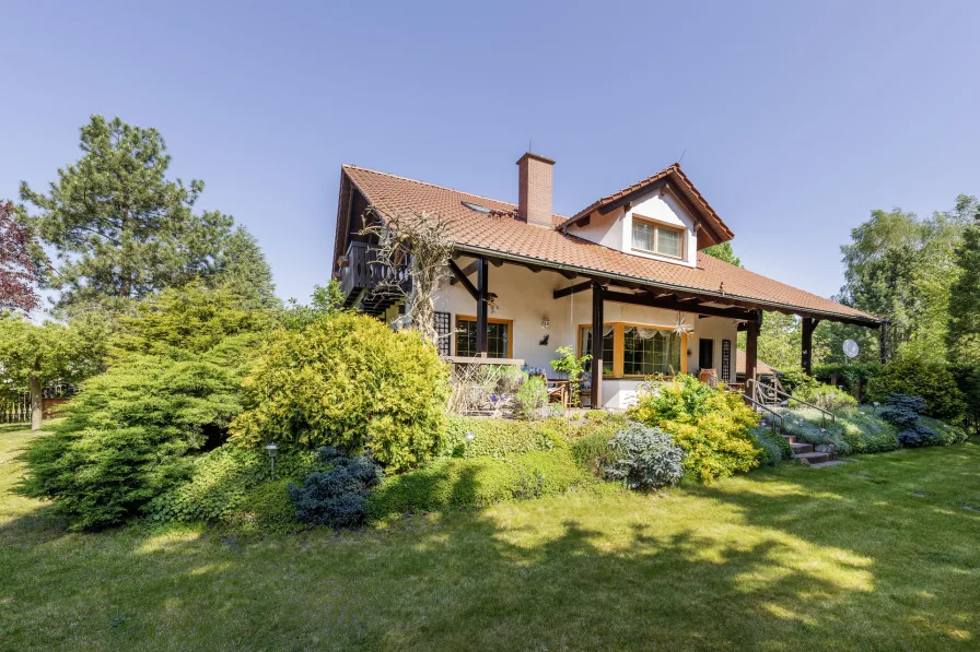 Gartenasicht - Haus kaufen in Oberkrämer - Hier finden Sie viel Platz für Ihre große Familie - mit Garten, Keller und Garage