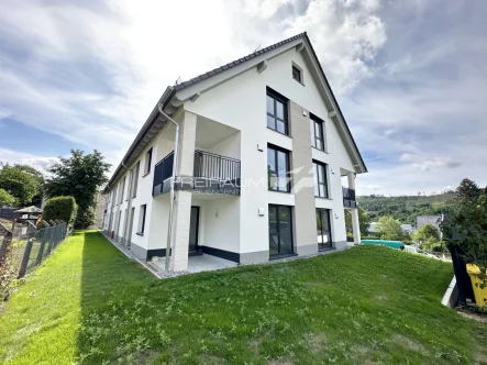 Gartenansicht - Wohnung kaufen in Bad Laasphe - FREIRAUM4 +++ Moderne Premiumwohnung in zentraler Lage von Bad Laasphe!