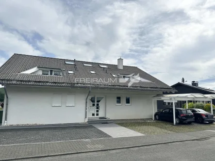 Frontansicht - Wohnung kaufen in Wilnsdorf / Niederdielfen - FREIRAUM4 +++ Exklusive Wohnung mit Penthouse-Feeling und Panoramablick,  moderner offener Grundriss