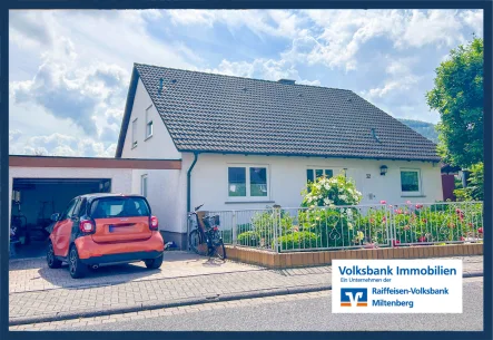  - Haus kaufen in Bürgstadt - Exklusives Einfamilienhaus mit Einliegerwohnung und Traumgarten in begehrter Lage von Bürgstadt