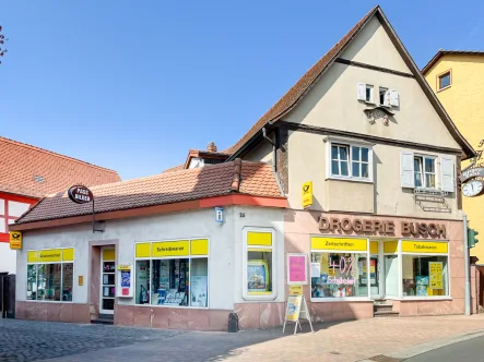 Frontansicht - Haus kaufen in Großheubach - Vielseitiges Wohn- und Geschäftshaus mit Ausbaupotenzial im Herzen von Großheubach