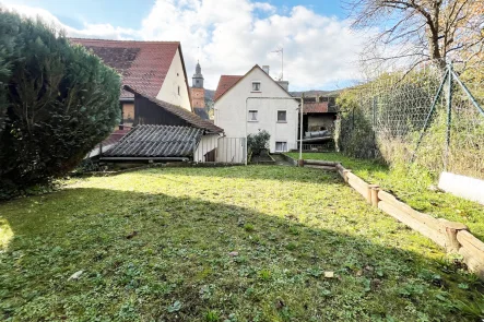 Gartenansicht - Haus kaufen in Collenberg - Handwerkerjuwel mit Potenzial – Charmantes Eigenheim in Collenberg