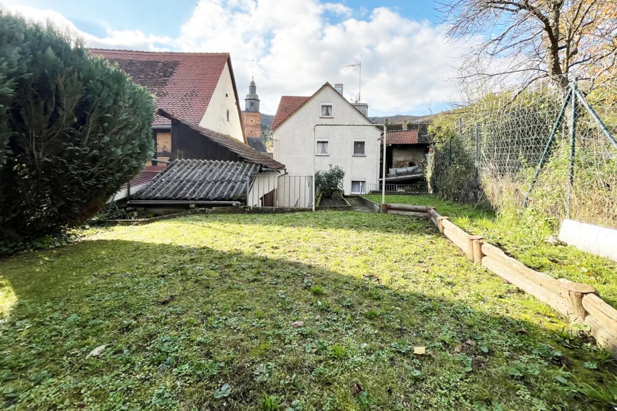 Gartenansicht - Haus kaufen in Collenberg - Handwerkerjuwel mit Potenzial – Charmantes Eigenheim in Collenberg