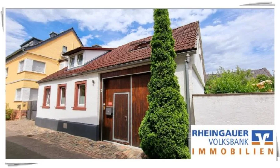 Außenansicht - Haus kaufen in Oestrich-Winkel -  Oestrich: Gemütliches Einfamilienhaus mit Garten und Remise