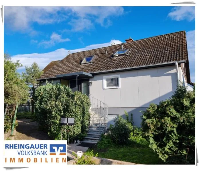 Exposé - Haus kaufen in Rüdesheim am Rhein - ** Rüdesheim-Presberg: Zweiparteienhaus mit Einliegerwohnung in ruhiger Lage **