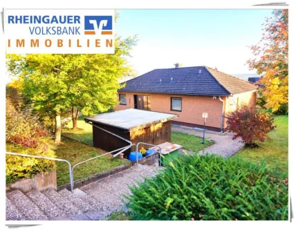 Ansicht Exposé - Haus kaufen in Geisenheim - ** Johannisberg: Bungalow mit 1.158 m² Grundstück direkt an den Weinbergen **