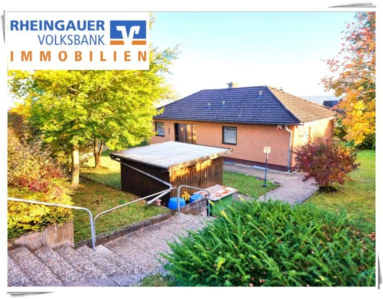 Ansicht Exposé - Haus kaufen in Geisenheim - ** Johannisberg: Bungalow mit 1.151 m² Grundstück direkt an den Weinbergen **