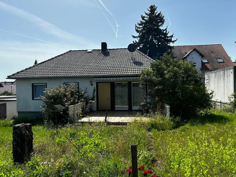  - Haus kaufen in Weisenheim am Berg - Traumhafter Bungalow in begehrter Lage von Weisenheim am Berg