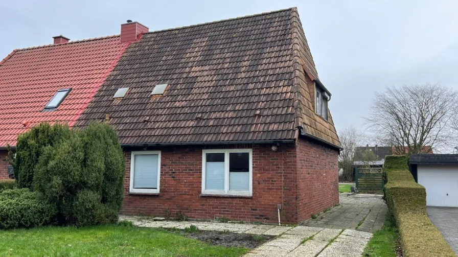 Ansicht Straße - Haus kaufen in Sande / Cäciliengroden - Doppelhaushälfte am Jadebusen