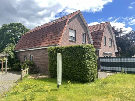 Titelbild - Haus kaufen in Schortens - Kompakt und gepflegt in ruhiger Lage