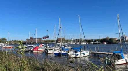 Titelbild - Wohnung kaufen in Wittmund - LAGE! LAGE! LAGE!Am Yachthafen in Carolinensiel!