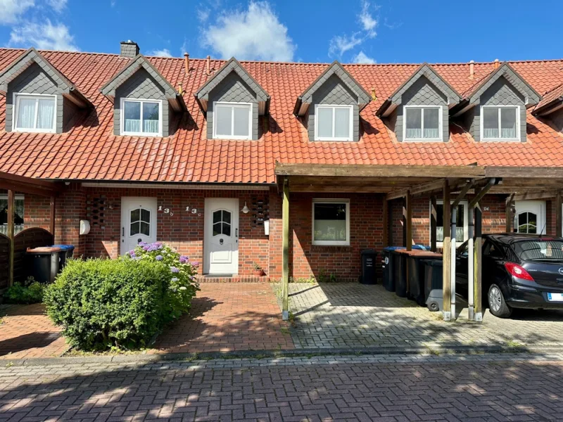 Ansicht - Haus kaufen in Wangerland / Hohenkirchen - Gepflegtes Reihenmittelhaus in Hohenkirchen