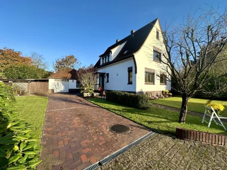 Titelbild - Haus kaufen in Zetel - Einfamilienhaus mit Stil!