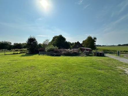 Titelbild - Grundstück kaufen in Wangerland - Idyllisches Baugrundstück im grünen Herzen der Nordsee