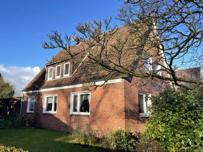 Titelbild - Haus kaufen in Schortens - Sillenstede: Kompaktes Einfamilienhaus auf Erbbaugrundstück