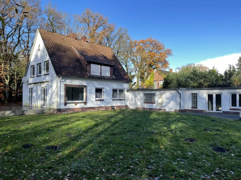 Titelbild - Haus kaufen in Schortens - Modernisiertes Einfamilienhaus mit tollem Grundstück