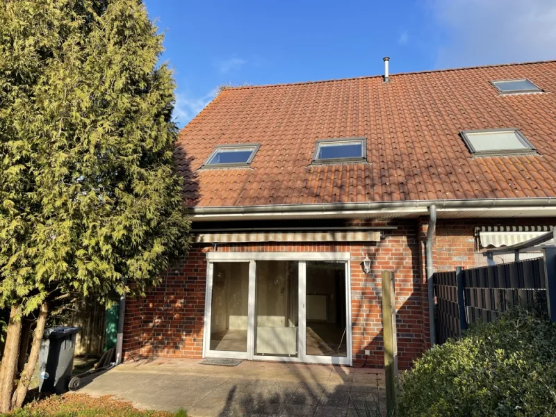 Titelbild - Haus kaufen in Schortens - Reihenendhaus mitten in Schortens-Heidmühle