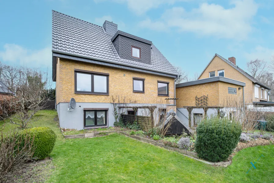 Titel - Haus kaufen in Glücksburg - Gute Aussichten: Teilmodernisiertes Einfamilienhaus in Feldrandlage in Glücksburg