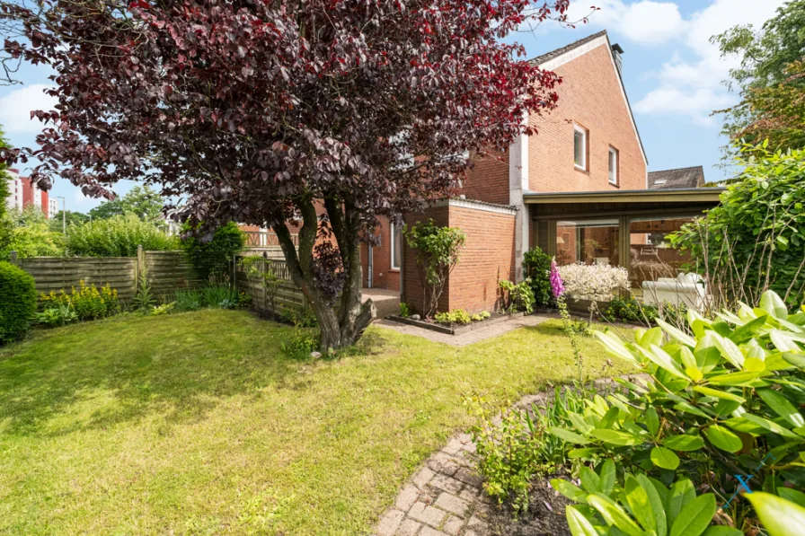 Garten - Haus kaufen in Flensburg - Ihr Reihenendhaus auf der westlichen Höhe wartet auf Sie - jetzt mit neuem Preis!