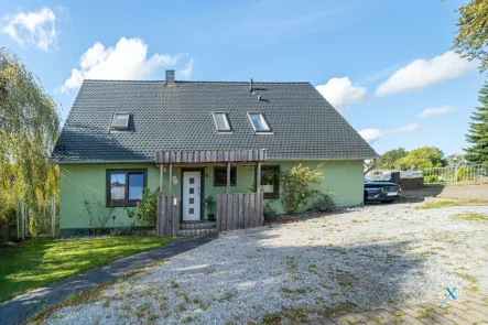 Außenansicht - Haus kaufen in Norderbrarup - Platz für die ganze Familie und Ihr Kleingewerbe – Charmantes Haus mit Garten in Norderbrarup