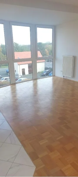 Bild... - Wohnung kaufen in Machern - Ansprechende 4 Zimmer Wohnung mit Kaminofen und Tiefgaragenstellplatz in Machern b. Leipzig