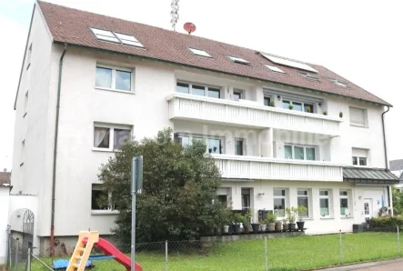 Mehfamilienhaus - Wohnung kaufen in Nürnberg - Helle 3,5-Zi-Wohnung mit sonnigem Süd-Balkon inkl. Garage im beliebten  Nürnberg-Katzwang