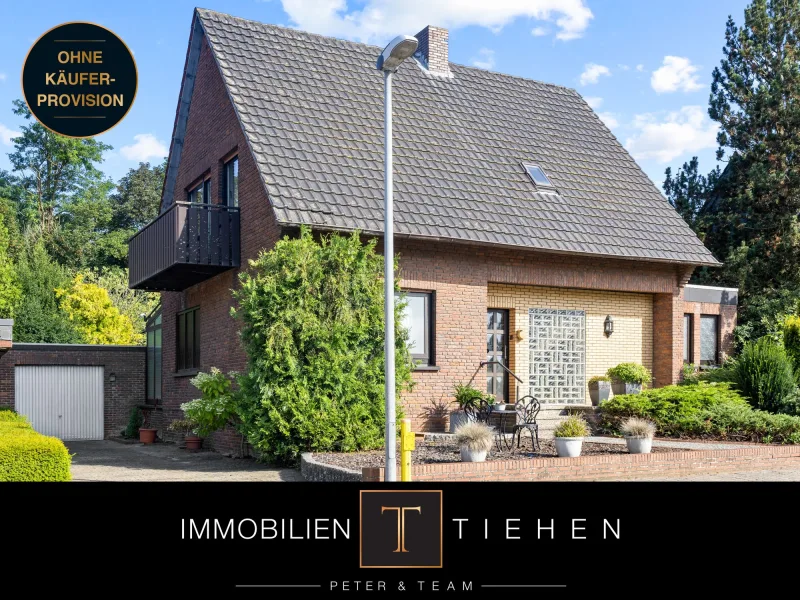  - Haus kaufen in Meppen / Esterfeld - Alles unter Dach und Wintergarten: Einfamilienhaus mit angelegtem Garten, Garage und Teilkeller!